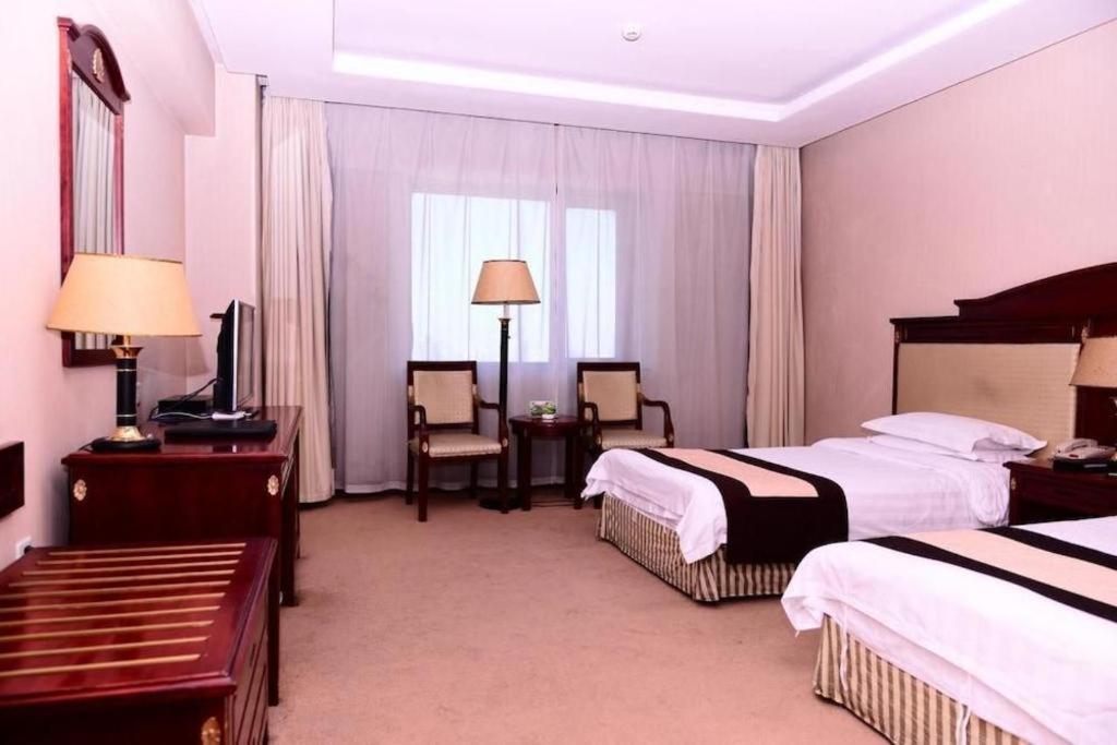 Heilongjiang Kunlun Hotel Харбин Экстерьер фото