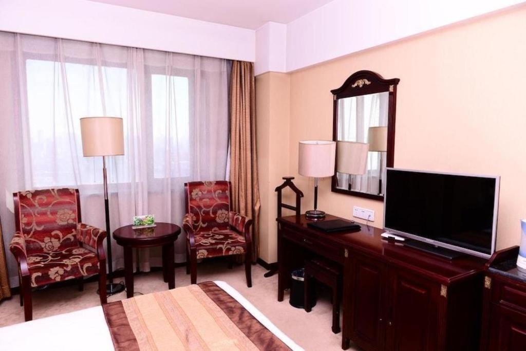 Heilongjiang Kunlun Hotel Харбин Экстерьер фото