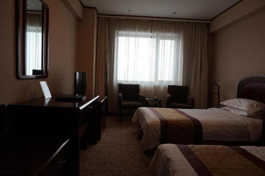 Heilongjiang Kunlun Hotel Харбин Экстерьер фото