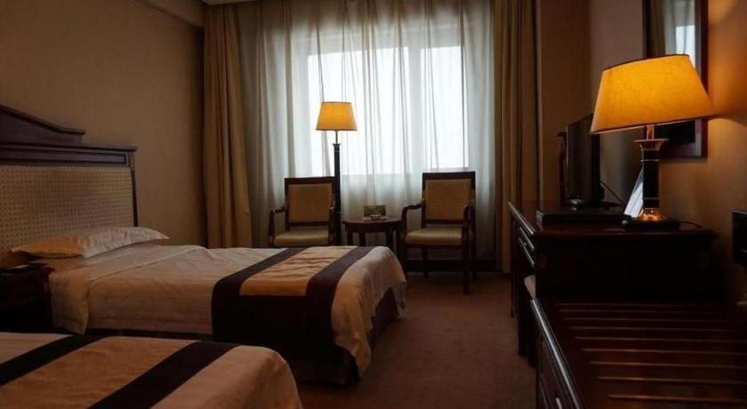 Heilongjiang Kunlun Hotel Харбин Экстерьер фото