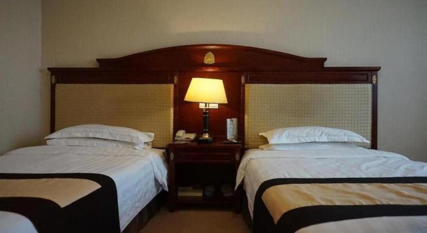Heilongjiang Kunlun Hotel Харбин Экстерьер фото
