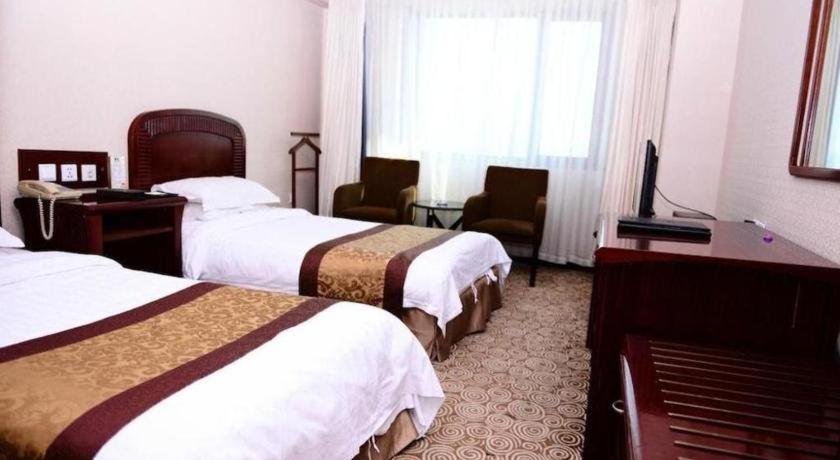 Heilongjiang Kunlun Hotel Харбин Экстерьер фото
