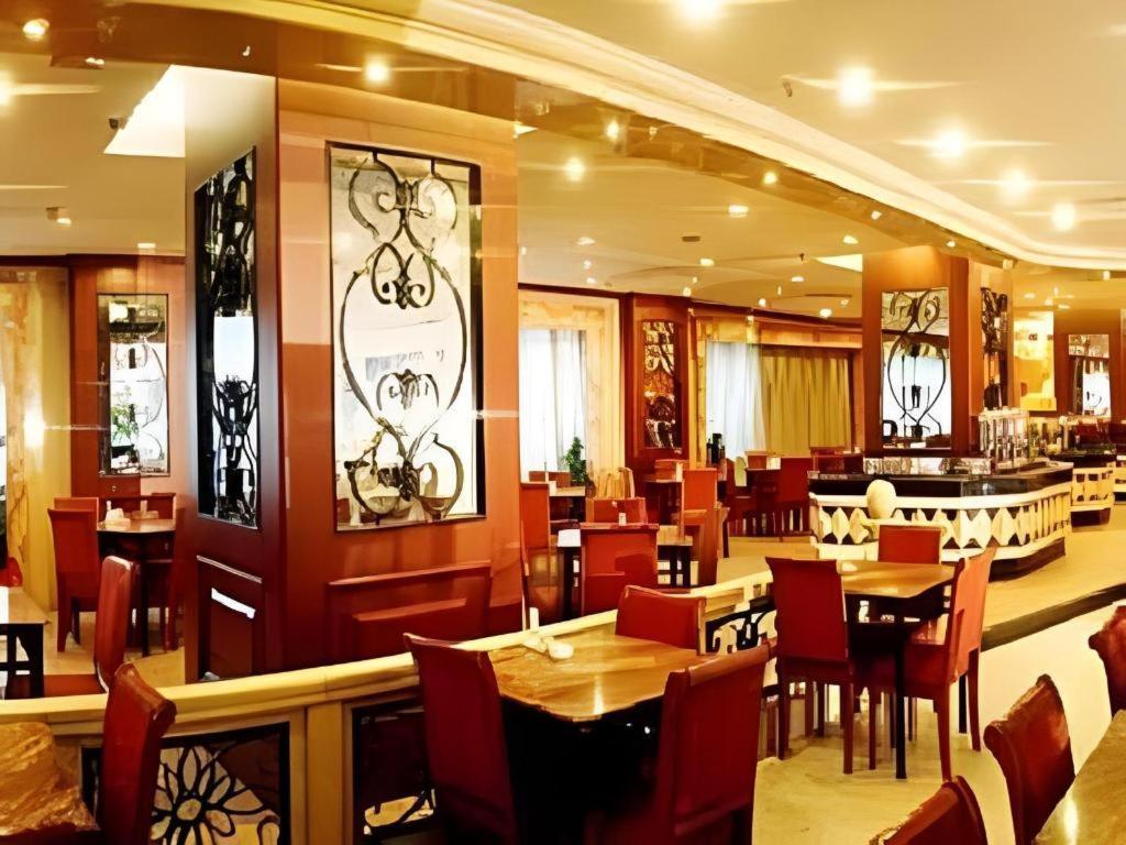 Heilongjiang Kunlun Hotel Харбин Экстерьер фото